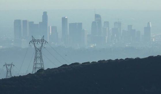 The buildings of downtown Los Angeles are partially obscured in the late afternoon on November 5, 2019 as seen from Pasadena, California. (Photo by Mario Tama/Getty Images)