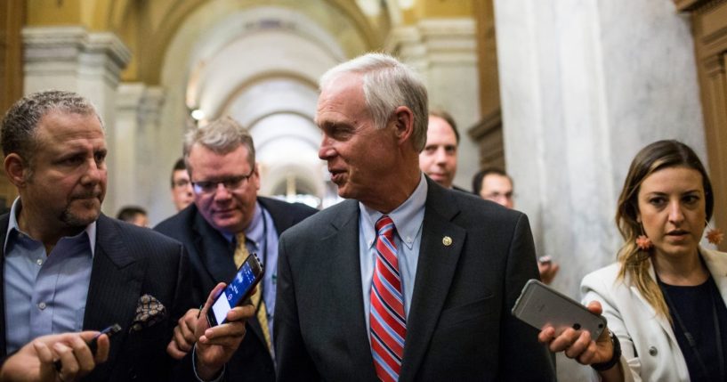 Sen. Ron Johnson speaks to reporters after a meeting with Senate Republicans on Capitol Hill Nov. 29, 2017, in Washington, D.C.