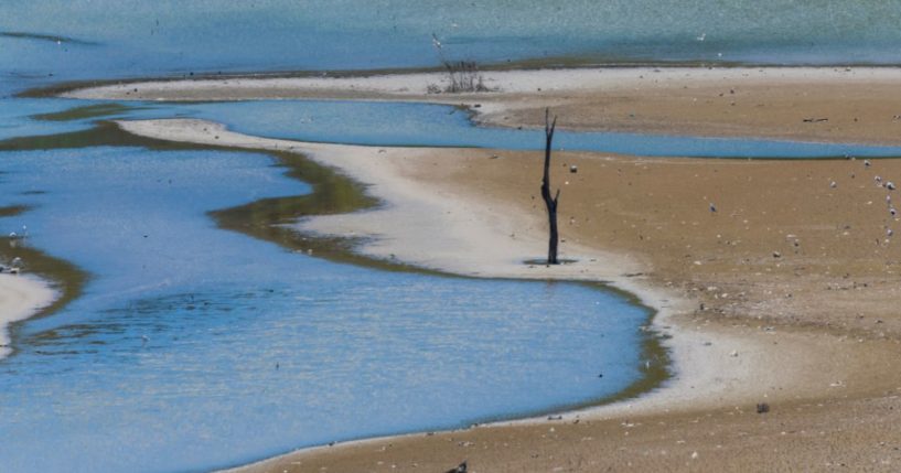 The above stock image is of a dried out lake.