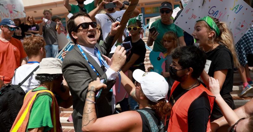 Alex Stein counter-protests against people protesting the Turning Point USA Student Action Summit outside the Tampa Convention Center in Tampa, Florida, on July 23.