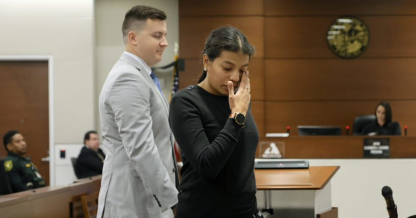 Ines Hixon, wipes away tears as she leaves the podium with her husband, Tommy Hixon, after she gave a victim impact statement during the sentencing for Parkland Killer Nikolas Cruz in Fort Lauderdale, Florida, on Tuesday.