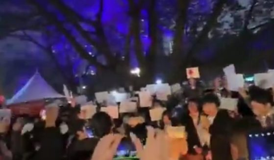 Chinese protesters use blank sheets of white paper to protest the government's COVID lockdowns.