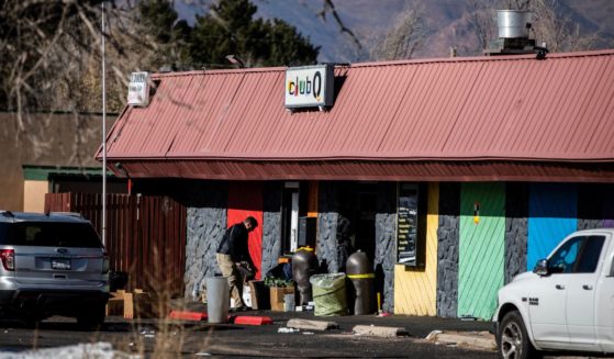 Investigators work outside of Club Q in Colorado Springs, Colorado, on Tuesday.