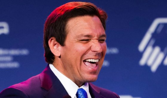 Florida Gov. Ron DeSantis smiles while speaking at the Republican Jewish Coalition's annual leadership meeting in Las Vegas on Saturday.