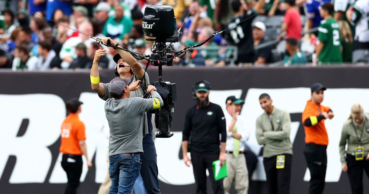 Crews work to repair a SkyCam in the second half of a game between the Buffalo Bills and the New York Jets at MetLife Stadium on Sunday.