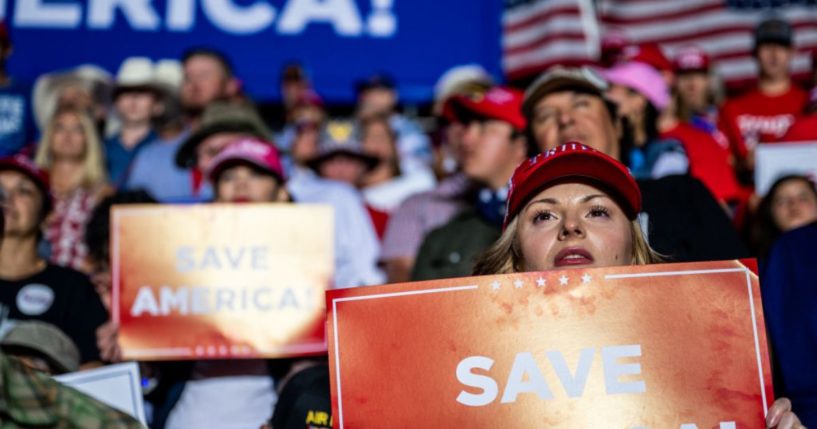 Supporters listen as former President Donald Trump speaks at a rally on Oct. 22 in Robstown, Texas.