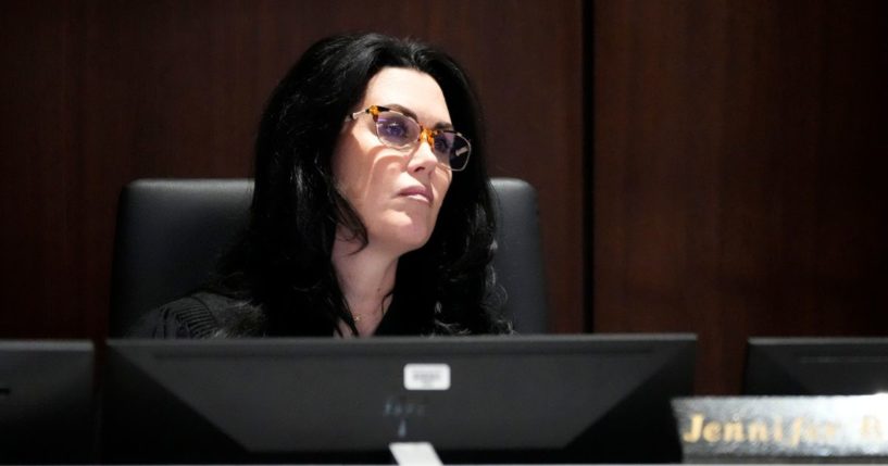 Waukesha County Circuit Court Judge Jennifer Dorow listens as Darrell Brooks gives his closing remarks during his sentencing in a Waukesha County Circuit Court in Waukesha, Wisconsin, on Wednesday.