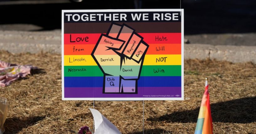 A sign stands at a makeshift memorial near the scene of a mass shooting at a gay nightclub in Colorado Springs, Colorado, on Wednesday.