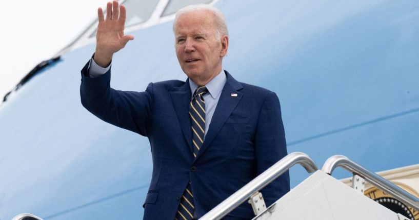 President Joe Biden boards Air Force One prior to his departure from Cambodia's Phnom Penh International Airport on Sunday as he travels to Bali, Indonesia, to attend the G20 Summit.