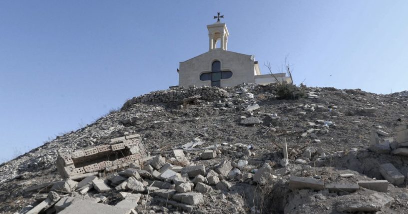 A picture taken on November 19, 2021 shows a view of the rubble of broken tombstones, damaged by Islamic State group fighters during their occupation of northern Iraq, at the Chaldean Monastery of St George in Mosul.