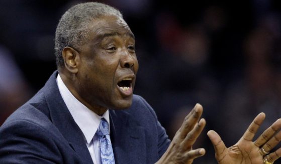 Charlotte Bobcats coach Paul Silas argues a call during the first half of an NBA basketball game against the Chicago Bulls in Charlotte, North Carolina, on April 18, 2012.