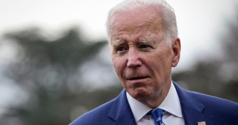 President Joe Biden talks with reporters on the South Lawn of the White House on Wednesday in Washington, D.C.