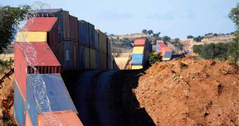 A long row of double-stacked shipping containers, erected by Arizona Gov. Doug Ducey to deter illegal immigrants, is being removed on the order of incoming Gov. Katie Hobbs.