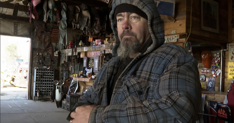 David Hollon stands inside his garage in Autauga County, Alabama on Saturday.