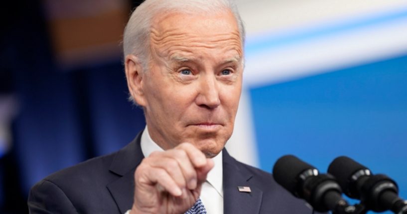 President Joe Biden responds a reporter's question in the Eisenhower Executive Office Building on the White House grounds on Thursday.