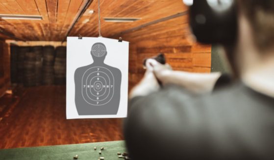 The above stock image is of a man at a shooting range.