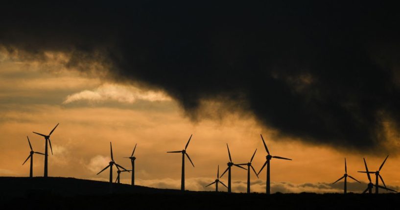 Wind turbines stand at an onshore wind farm in Llandinam, central Wales, on Monday.