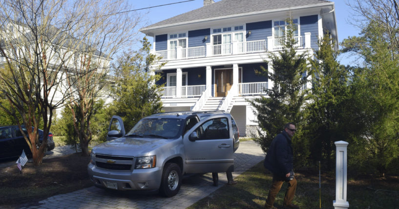 U.S. Secret Service agents are pictured in front of President Joe Biden's Rehoboth Beach, Delaware, home on Jan. 12.