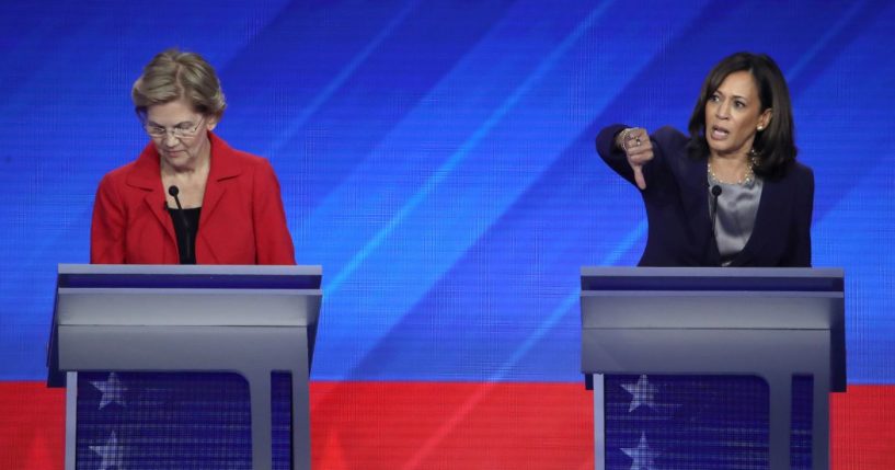 Sen. Elizabeth Warren (D-MA) and then-Sen. Kamala Harris (D-CA) interact on stage during the Democratic Presidential Debate at Texas Southern University's Health and PE Center on September 12, 2019 in Houston.