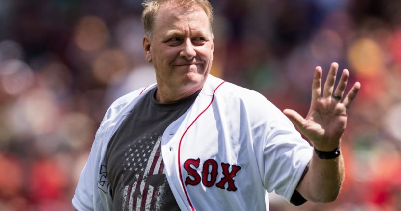 Former Boston Red Sox player Curt Schilling is introduced before a game against the Kansas City Royals on July 30, 2017, at Fenway Park in Boston.