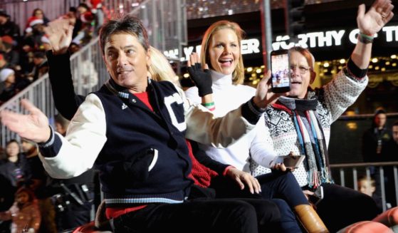 Scott Baio, left, Josie Davis, middle, and Willie Aames, right, ride in the 88th Annual Hollywood Christmas Parade held on Dec. 1, 2019, in Hollywood, California.