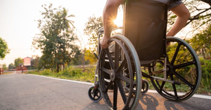 The above stock image is of someone in a wheelchair.