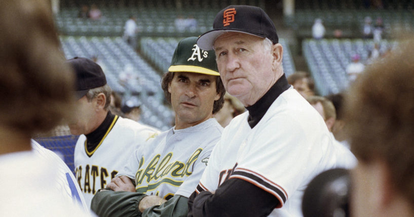 National League manager Roger Craig of the San Francisco Giants, right, and American League manager Tony La Russa of the Oakland A's watch batting practice before the 61st MLB All-Star Game at Wrigley Field in Chicago on July 10, 1990.