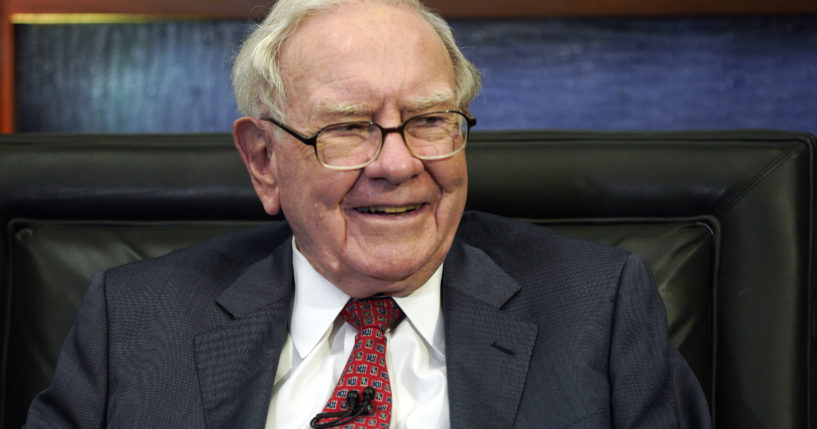 Berkshire Hathaway CEO Warren Buffett smiles during an interview in Omaha, Neb., in May 2018. After years of steady payments, Buffett has given billions in donations to the Bill & Melinda Gates Foundation and to other foundations connected to his family.