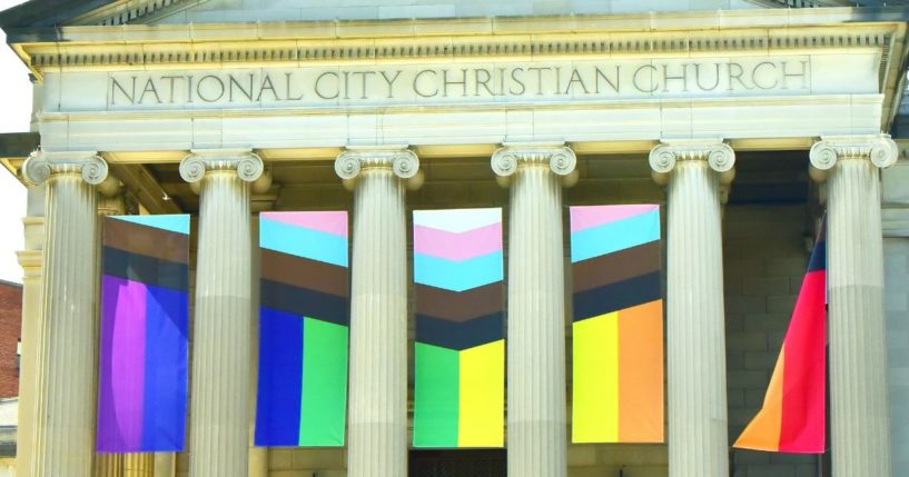 The front entrance of the National City Christian Church in Washington features an LGBT "pride" flag" on June 5, 2021.