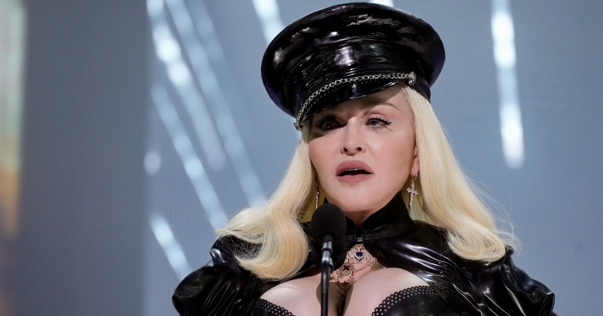 Pop star Madonna, seen in a 2021 file photo, was hospitalized in an intensive care unit after being found unresponsive.