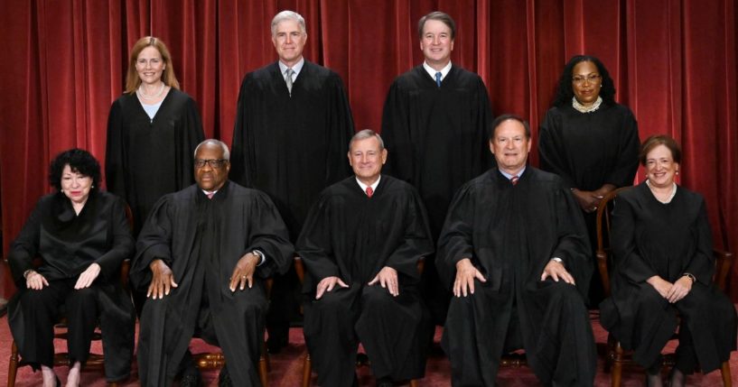 Supreme Court justices pose for their official photo at the Supreme Court in Washington, D.C., on Oct. 7, 2022. Seated from left: Associate Justice Sonia Sotomayor, Associate Justice Clarence Thomas, Chief Justice John Roberts, Associate Justice Samuel Alito and Associate Justice Elena Kagan. Standing from left: Associate Justice Amy Coney Barrett, Associate Justice Neil Gorsuch, Associate Justice Brett Kavanaugh and Associate Justice Ketanji Brown Jackson.