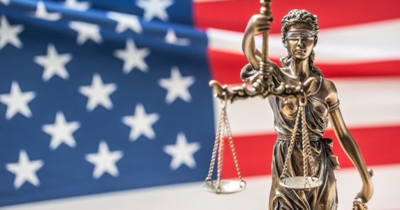 A figure of Lady Justice is seen in the above stock image.