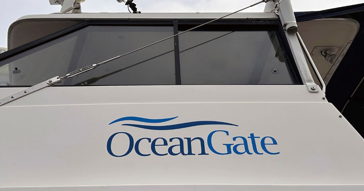 The logo for OceanGate Expeditions is seen on a boat parked near the offices of the company at a marine industrial warehouse office door in Everett, Washington, on June 20.