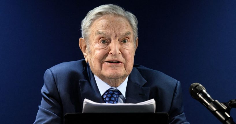 Hungarian-born billionaire George Soros is pictured addressing the assembly on the sidelines of the World Economic Forum annual meeting in Davos in a file photo from May 24, 2022.