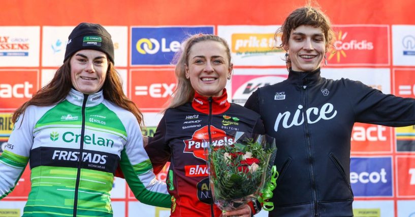 Transgender U.S. cyclist Austin Killips, right, stands on the podium alongside two female competitors -- Marion Norbert Riberolle of Belgium and Denise Betsema of the Netherlands -- after the women's elite race of the Kasteelcross in Zonnebeke, Belgium, on Jan. 21.