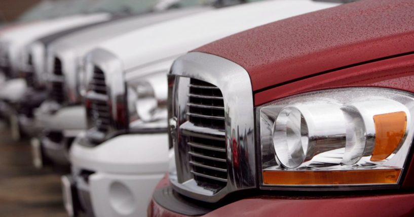 Dodge Ram pickup trucks sit on the lot of a dealership in Littleton, Colorado, on Nov. 12, 2006.