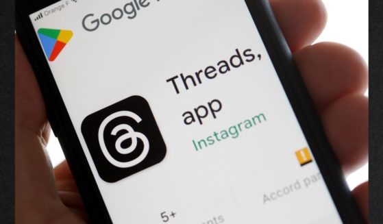 In this photo illustration, the logo of the social media application Threads is displayed on Google Play. Meta, the parent company of Instagram and Facebook, has officially launched Threads, Instagram's text-based conversation app, to compete with Elon Musk's social network, Twitter.