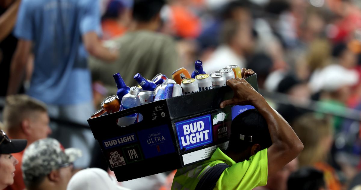 A vendor sells alcohol during the Baltimore Orioles and Cincinnati Reds game at Oriole Park at Camden Yards on June 28, 2023 in Baltimore, Maryland.