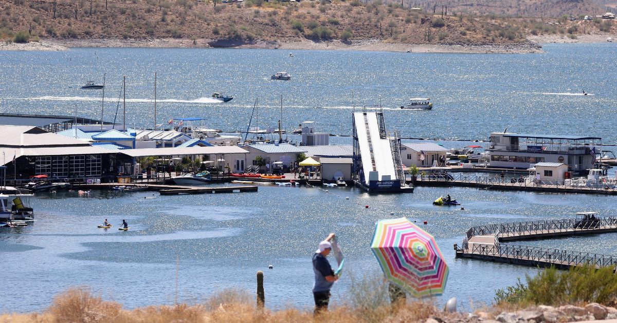 People spend their Independence day holiday at Lake Pleasant on July 4, 2020, in Morristown, Arizona.