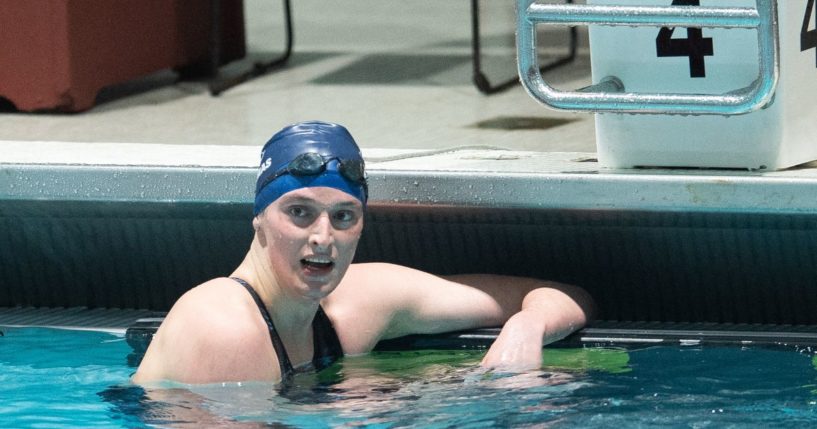 University of Pennsylvania swimmer Lia Thomas looks on after swimming the 500 freestyle during the 2022 Ivy League Womens Swimming and Diving Championships at Blodgett Pool on Feb. 17, 2022, in Cambridge, Massachusetts.