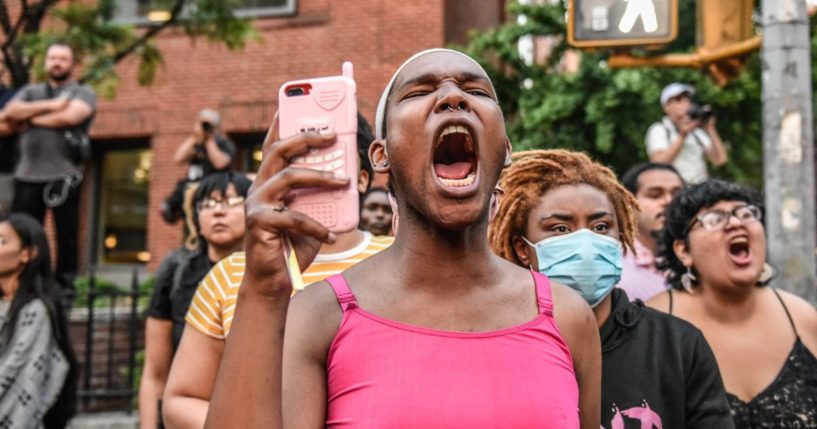 People participate in a weekly protest in support of the transgender agenda on May 31 in New York City.