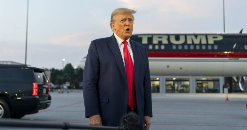 Donald Trump speaking with reporters