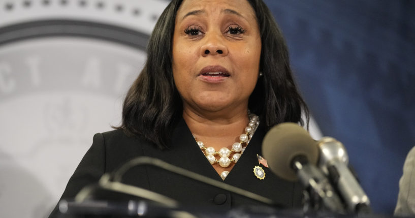 Fulton County District Attorney Fani Willis speaks in the Fulton County Government Center during a news conference in Atlanta on Aug. 14.