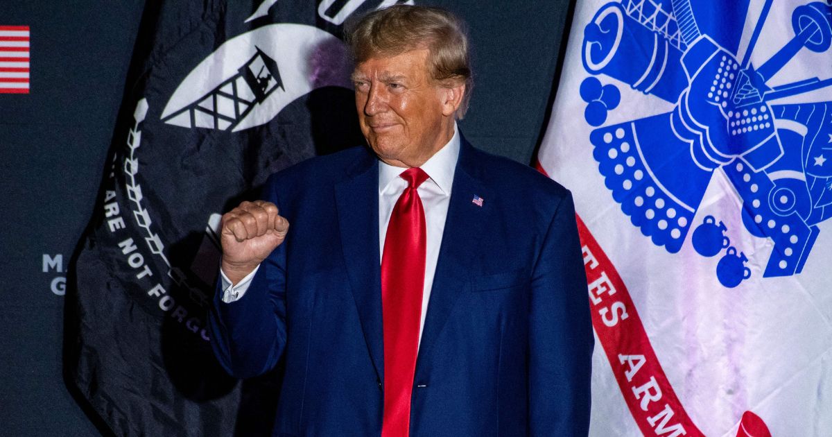 Former President Donald Trump arrives to speak at a rally in Windham, New Hampshire, on Aug. 8.