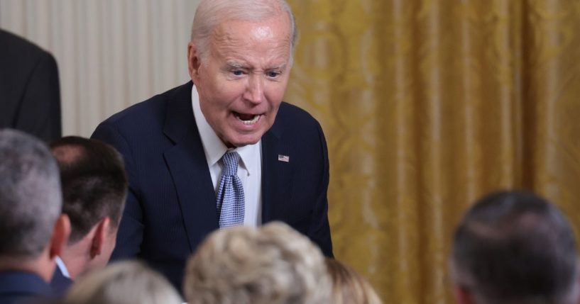 President Joe Biden greets audience members during an event in the East Room of the White House on Wednesday in Washington, D.C.