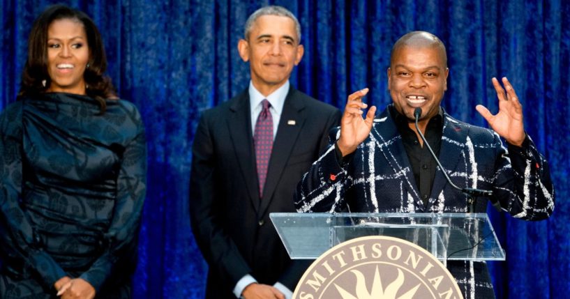 Former President Barack Obama and former first lady Michelle Obama watch as artist Kehinde Wiley, right, speaks during an unveiling ceremony for the Obamas' portraits at the Smithsonian's National Portrait Gallery in Washington on Feb. 12, 2018.