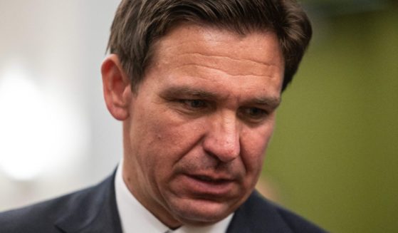 Florida Gov. Ron DeSantis looks on after speaking at an event in Des Moines, Iowa, on July 28.