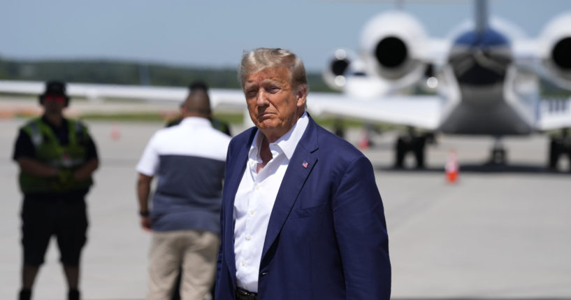 Republican presidential candidate and former President Donald Trump walks to his vehicle after arriving at the Des Moines International Airport before his visit to the Iowa State Fair in Des Moines on Saturday.