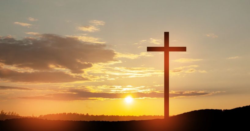 A cross is seen in this stock image.