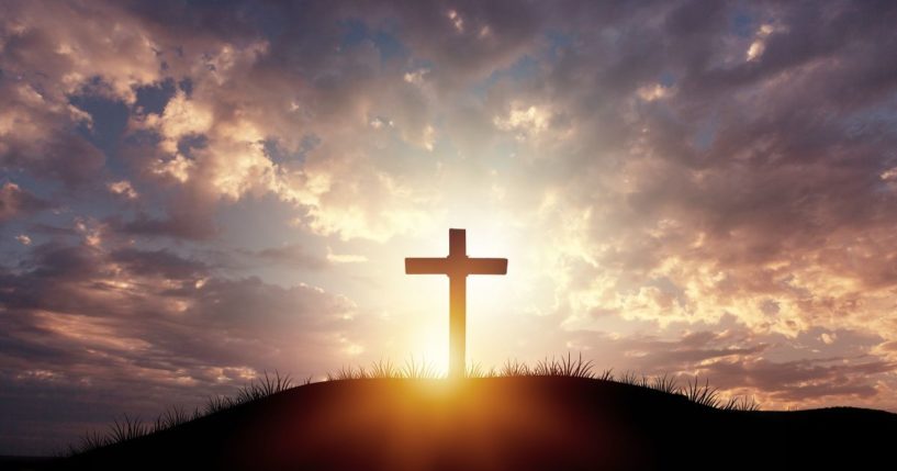 A cross is seen in this stock image.